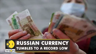 Russian currency tumbles to a record low as markets react to new economic sanctions | English News