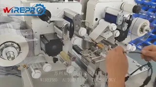 Semi automatic labelling machine for wrap around labels