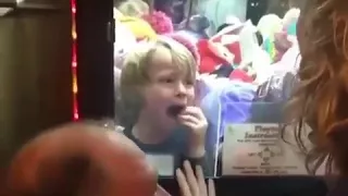 Boy stuck in claw machine