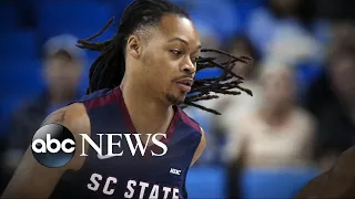 A college basketball player collapsed on the court during a game