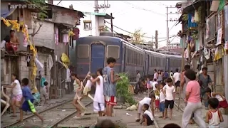 Manille la vie le long du train