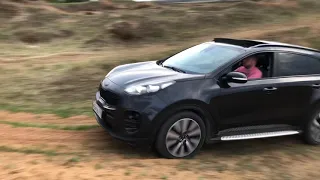 Kia Sportage offroad in sand dunes