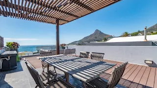 EXQUISITELY LOCATED VILLA WITH ROOFTOP DECK IN CAMPS BAY | CAPE TOWN LUXURY