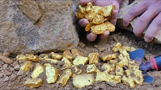 Super busy finding gold treasure, Digging gold Nuggets from Huge rock at mountain