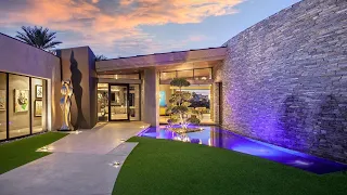 $12,950,000! This stunning architectural masterpiece in La Quinta is a true entertainers dream home