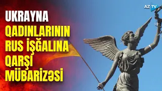 Ukrayna qadını azadlıq mücahidi qiyafəsində: onlar vətən uğrunda döyüşürlər...