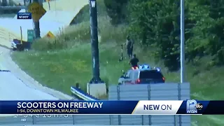 Electric scooter riders stranded on I-94 freeway