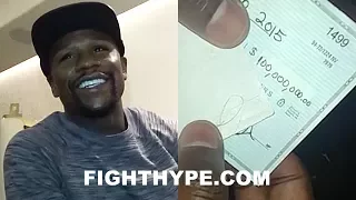 FLOYD MAYWEATHER SHOWS OFF $100 MILLION CHECK; STUNTS ON HATERS, LAUGHS AT TAX STORIES, BUYS 2 CARS