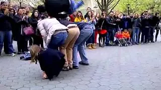 Central Park Acrobats jumping over Angie