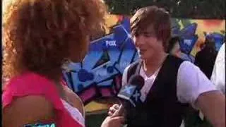 Zac Efron and Vanessa Hudgens on Extra