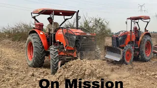 Tractor Kubota M6040 escalated the surface of rice paddies field #tractor