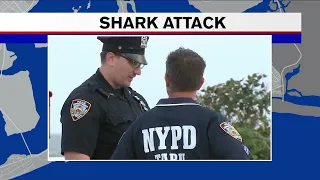 Officials survey Rockaway Beach after apparent shark attack