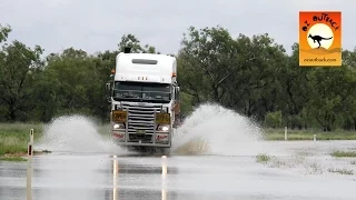 Road Trains crossing flooded river