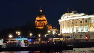 Petersburg at night is beautiful! Boat trip on the Neva. Breeding the bridge