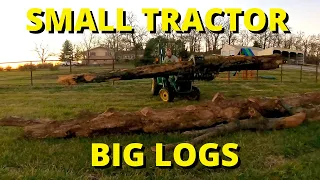 Small Tractor vs Big Logs - Trimming and Skidding a Big Log