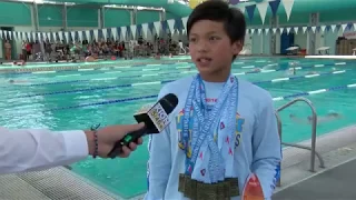 10-year-old swimmer beats Michael Phelps' 1995 record