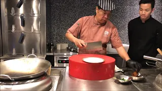 Chef Jian Chit Ming prepares amazing chicken wing filled with shrimp at 2 star Canton 8 in Shanghai