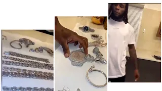 African giant Burna boy show off his expensive diamonds