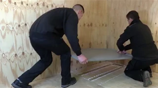 Installation of a shower tray onto joists and marine ply