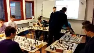 Simen Agdestein playing simultan against his students and loses a lot on time :-)