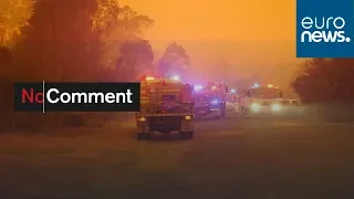 Orange sky keeps firefighters on alert in southern Australia