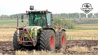 Трактор CLAAS XERION 3800 пашет поле старым советским плугом ПЛН-8-35 от трактора Кировец К-700