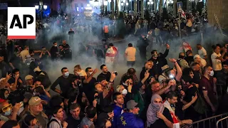 Police in Tbilisi disperse demonstrators outside Georgia's parliament