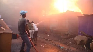 Massive fire destroys 650 homes and kills 2 in Mandela Park