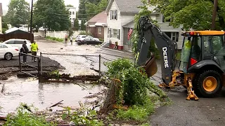 Roads in Mass. buckle under flooding triggered by heavy rain