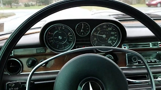 Behind the wheel driving mercedes w108 280se