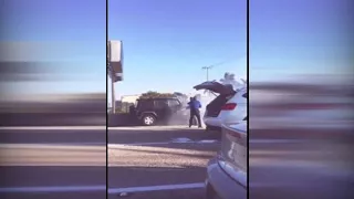 Baseball bat-wielding man comes to motorist's rescue