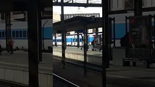 Train is arriving at Main Station in Prague.  Поезд прибывает на главный вокзал Праги