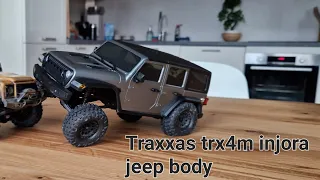 Traxxas trx4m with a brand new Injora jeep style body.