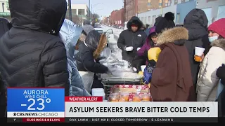 Some migrants in Chicago brave extreme cold just to get a hot meal