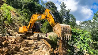 Heavy excavator clearing massive landslide on hilly road | Excavator video | Excavator Planet