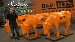 Orange Glass Fiber Cows - Bar & Block Steakhouse - Fibreglass Casts by Sculpture Studios