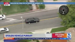 Occupants of suspected stolen car try to run across 5 Fwy after pursuit