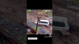 Toyota Landcruiser loaded with passengers gets washed away in islandwide flooding