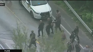 Man in custody after traffic stop in Miami-Dade leads to pursuit, foot chase and swim in canal