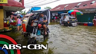 WATCH: Giant tricycles ride high over Bulacan floods | ABS-CBN News