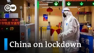 China puts millions under lockdown to contain coronavirus | DW News