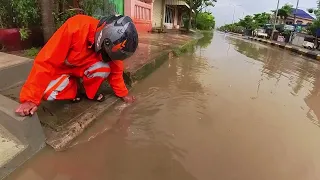 Unclogging Culvert Drain Flood Rain On Street Road