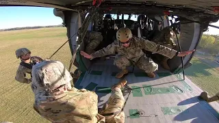 Rapelling out of a Black Hawk