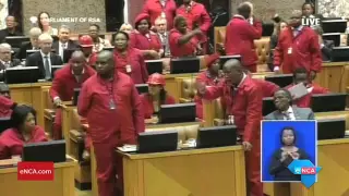 Opposition members walk out of Parliament