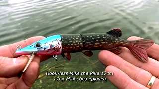 Pike attack baby Mike: testing new fishing lure.