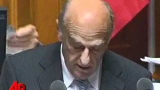 Raw Video: Swiss Minister Gets the Giggles