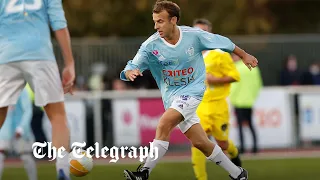 Macron scores a penalty in charity football match