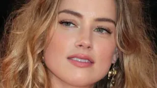 Body Language Expert Explains Amber Heard's Reaction To Her Legal Loss