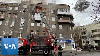 Ukraine Firefighters Battle Blaze Following Strikes in Kharkiv