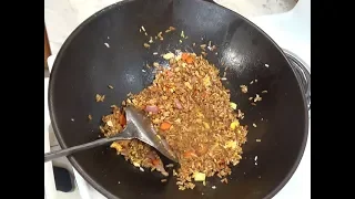 Fried Rice for Breakfast in a Cast Iron Wok